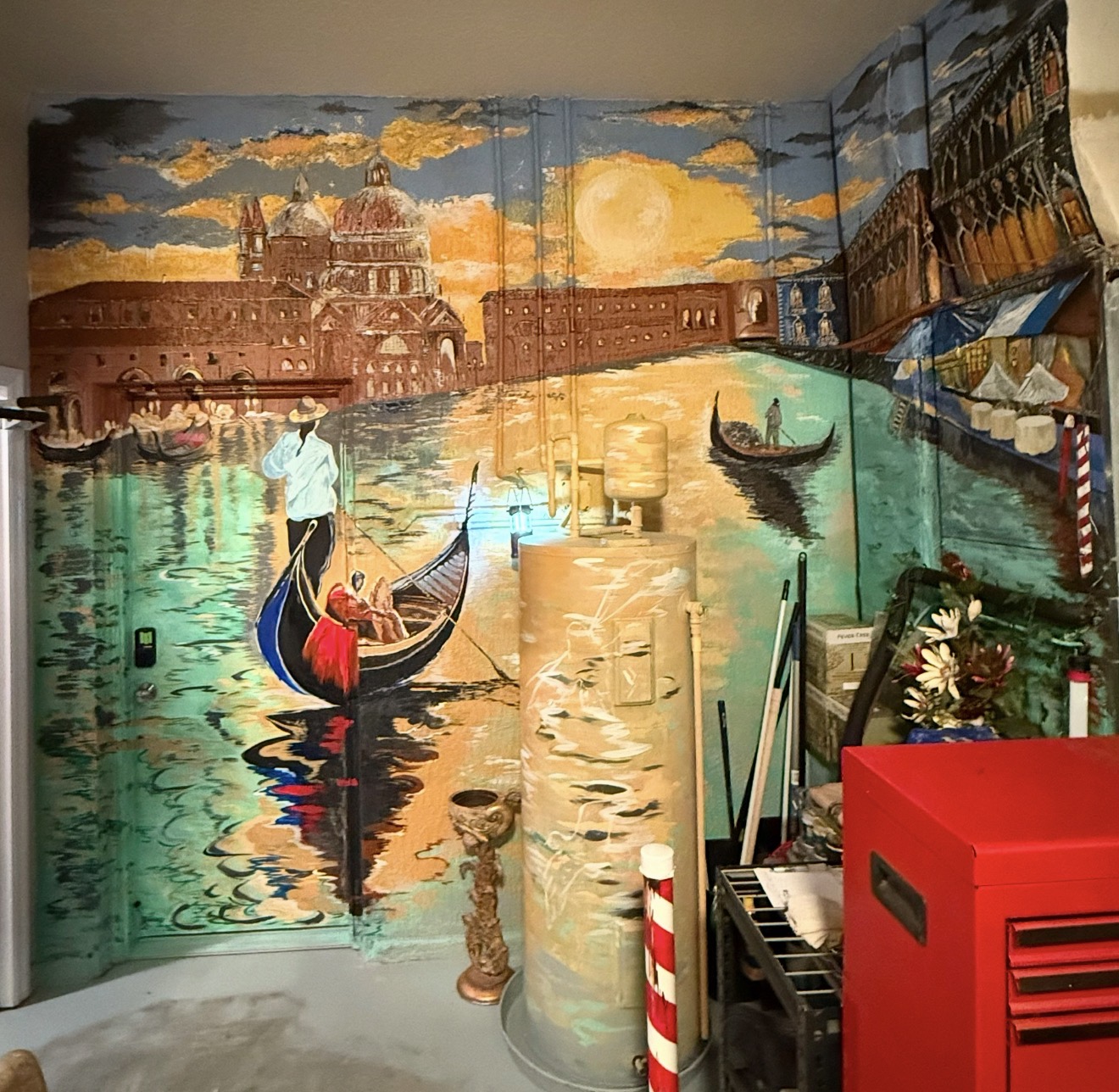 A wraparound Venice mural with gondolas, canal reflections, historic architecture, and a glowing sunset.